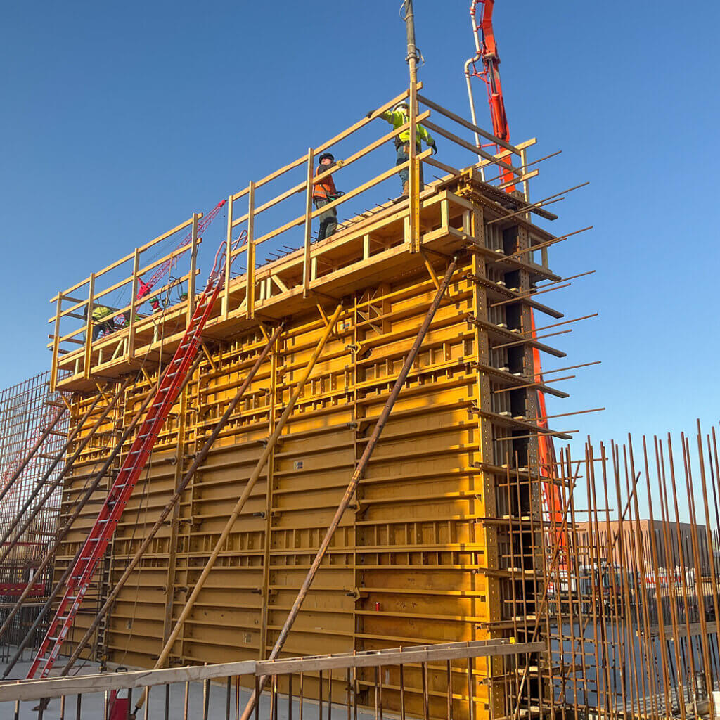 Wichita BNR | Dondlinger & Wildcat selected EFCO again because an unusually slow-setting concrete mix combined with 30-foot wall heights required higher pour-pressure ratings than typical wall forms provide.